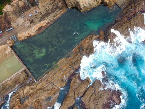 Blue pool and rocks at Bermagui from above - Australian Stock Image