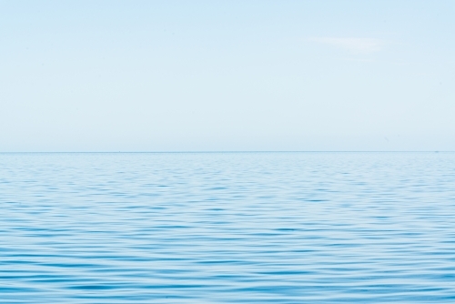 Blue sea and blue sky with clear horizon - Australian Stock Image