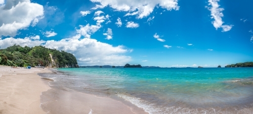 Blue sky white sand beach in paradise