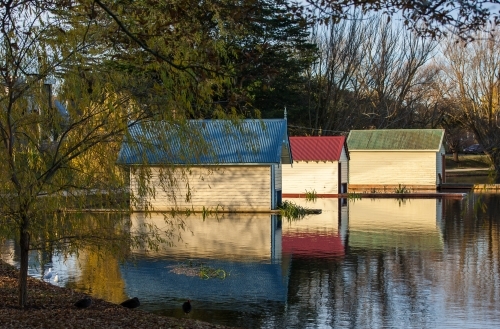 Boatsheds on lake - Australian Stock Image