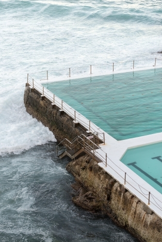 Bondi Icebergs pool with rough waves - Australian Stock Image
