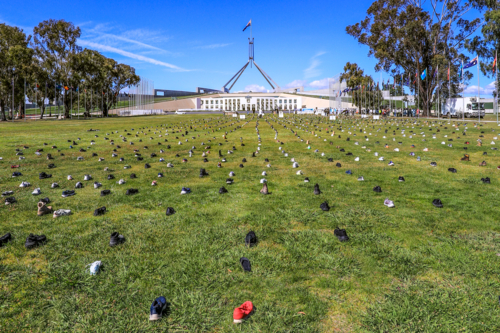 Boots lined up for Canberra Zero Suicide Awareness Day - Australian Stock Image