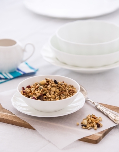 Bowl of organic Granola served at a table - Australian Stock Image