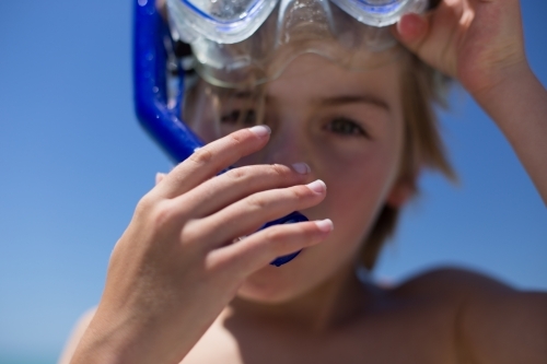 Boy with snorkle and goggles - Australian Stock Image