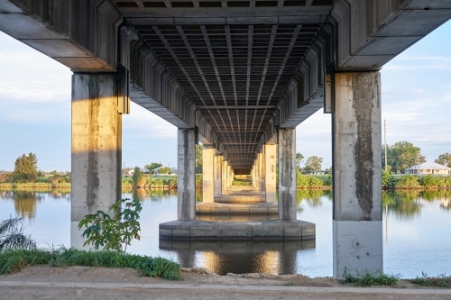Bridge over river on dusk - Australian Stock Image