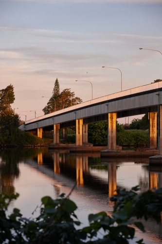 Bridge over river on dusk - Australian Stock Image