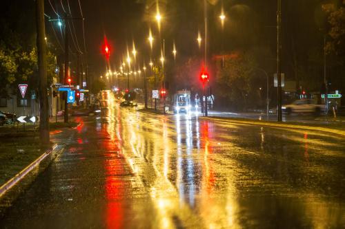 Bright light reflections on a rainy night - Australian Stock Image