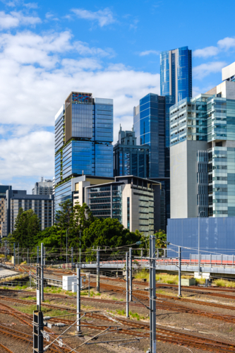 Brisbane CBD with Railway Tracks and Electrical Power Lines in the Forground - Australian Stock Image