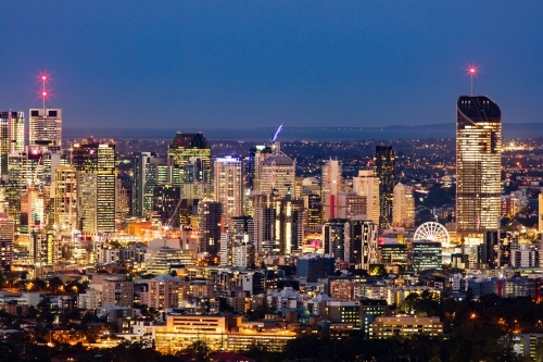 Brisbane city skyline at dusk as seen from Mt Coot-tha. - Australian Stock Image