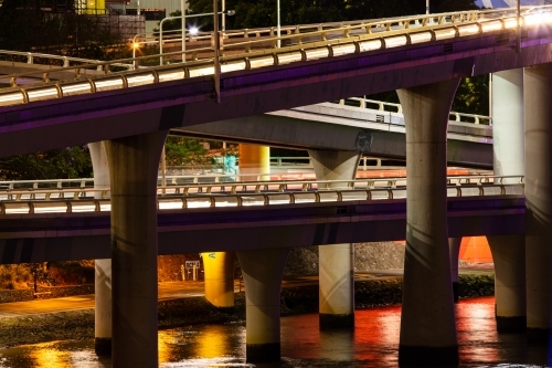 Brisbane's Riverside Expressway along the Brisbane River at night. - Australian Stock Image