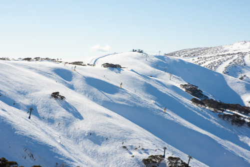 Broad view of mountain with ski lifts and runs at Mt Hotham - Australian Stock Image