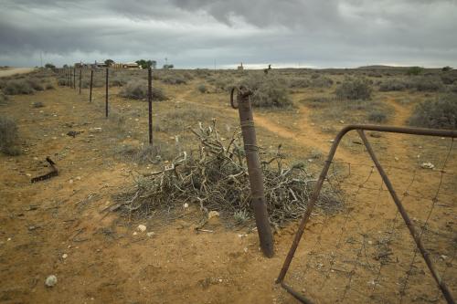 Broken gate and fence line in the outback