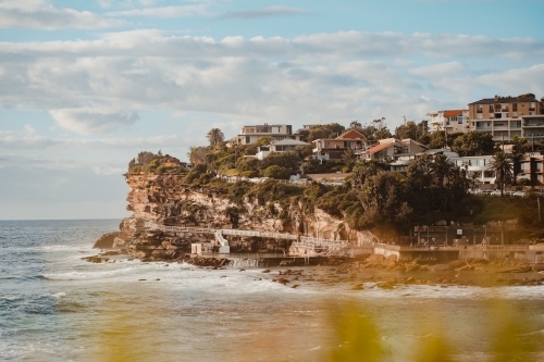 Bronte Ocean Pool (Bronte Baths) and headland on a sunny morning - Australian Stock Image