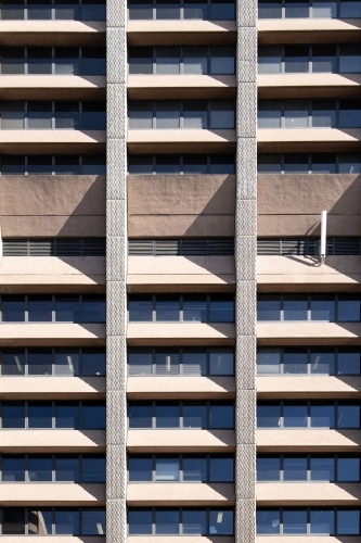 Brutalist Building Facade with Strong Shadows