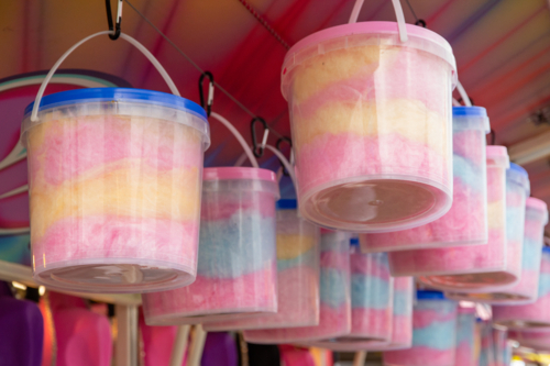 Buckets of fairy floss on display in food truck at showground during country show - Australian Stock Image