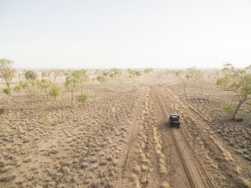 Buggy driving along road in outback