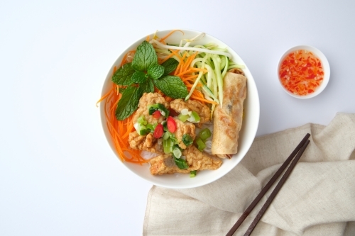 Bun Cha Gio bowl topped with fried spring roll and Cha Lua. - Australian Stock Image