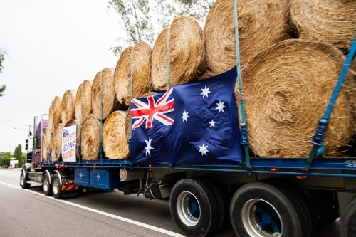 Burrumbuttock Hay Runners going through Singleton on their way to assist farmers - Australian Stock Image