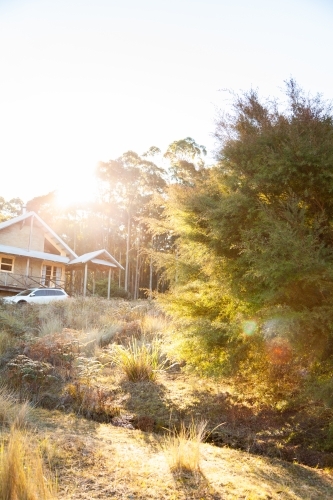 Cabin in the woods with car beside it on rural property in the hunter valley hills
