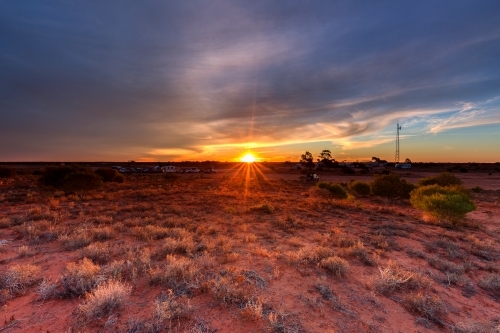 Cameron Corner sunset over caravan park - Australian Stock Image