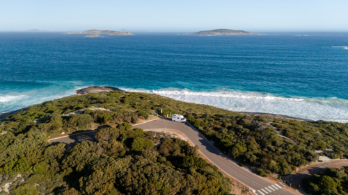 Camper van parked on the roadside along the coast - Australian Stock Image