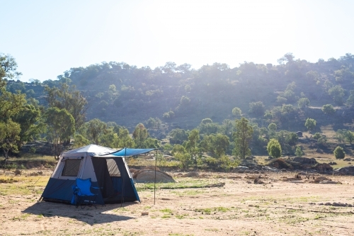 Camping holiday tent and chair at wyangala dam