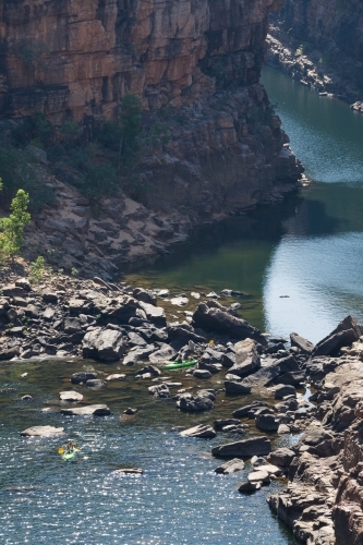 Canoeists in deep rocky gorge - Australian Stock Image