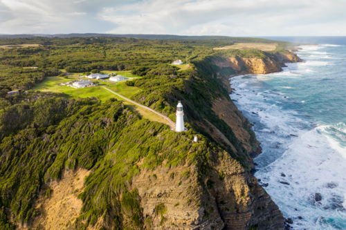 Cape Otway Lighthouse on Australian coastline seen from aerial view - Australian Stock Image
