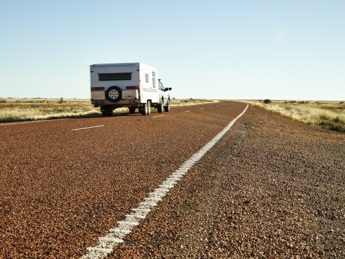 Car and caravan on Stuart Highway