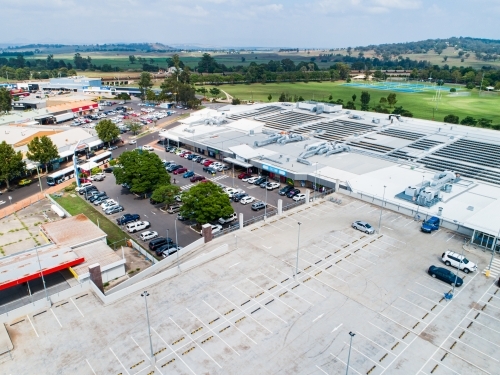 Car park beside shopping center in town - Australian Stock Image
