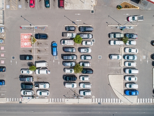 Car park beside shopping center in town - Australian Stock Image