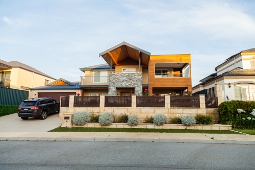 Car parked in driveway of home in Iluka Perth - Australian Stock Image