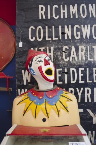 Carnival clown and vintage sign