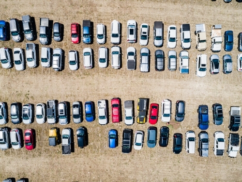 Cars parked in paddock during big sport event - Australian Stock Image