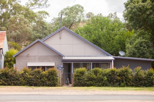 Cattle dog and his house - Australian Stock Image