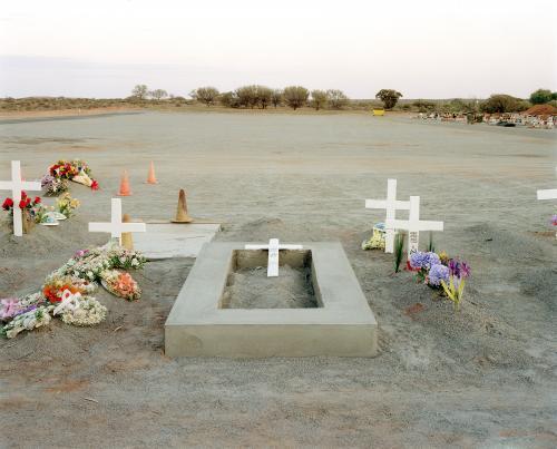 Cemetary in remote town with crosses and flowers