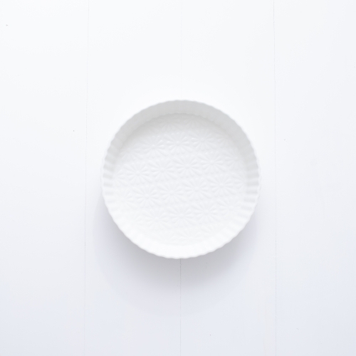 Ceramic pie dish on blank background - Australian Stock Image