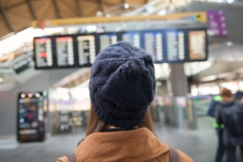 Checking the Train Timetable - Australian Stock Image