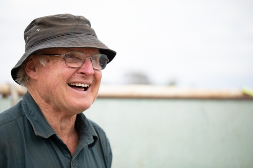 cheerful laughing self-employed manual worker - Australian Stock Image