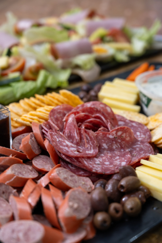 cheese and cold meet platter with vegetables - Australian Stock Image