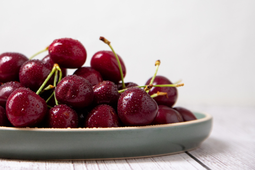 Cherries on a plate - Australian Stock Image