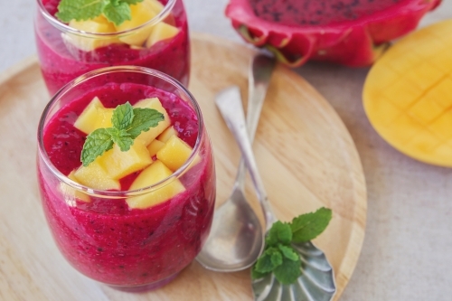 Chia seeds pudding with red dragon fruit and mango