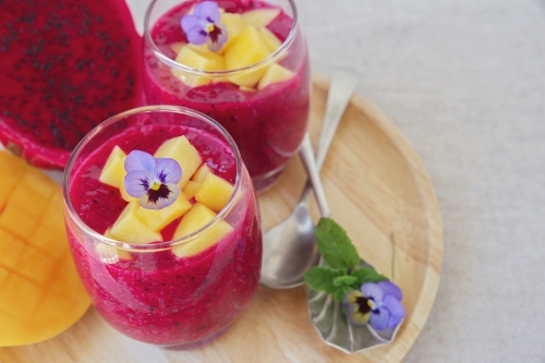 Chia seeds pudding with red dragon fruit and mango - Australian Stock Image