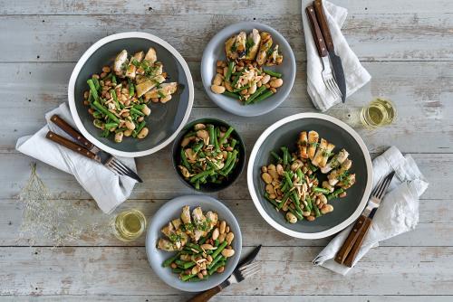Chicken and bean dish seen from above - Australian Stock Image