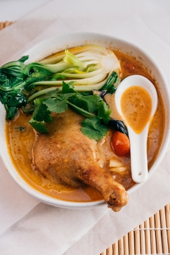 Chicken curry in a bowl.