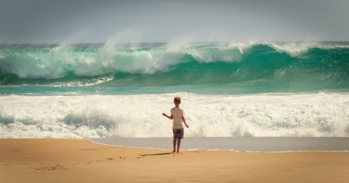 Child and waves at the beach, Yorke Peninsula, South Australia