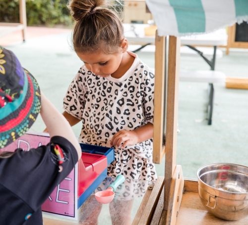 Children playing at a toy shop - Australian Stock Image