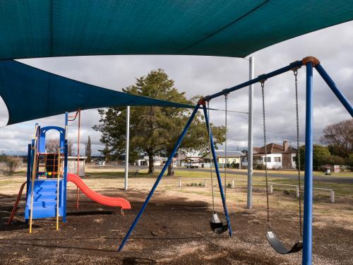 Children's playground under shade cloth - Australian Stock Image