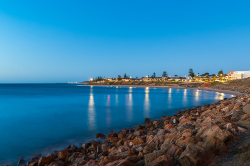 Christies Beach with Witton Bluff trail at dusk while viewed towards the Esplanade - Australian Stock Image