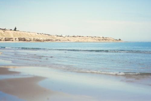 Cliff overlooking a beach - Australian Stock Image